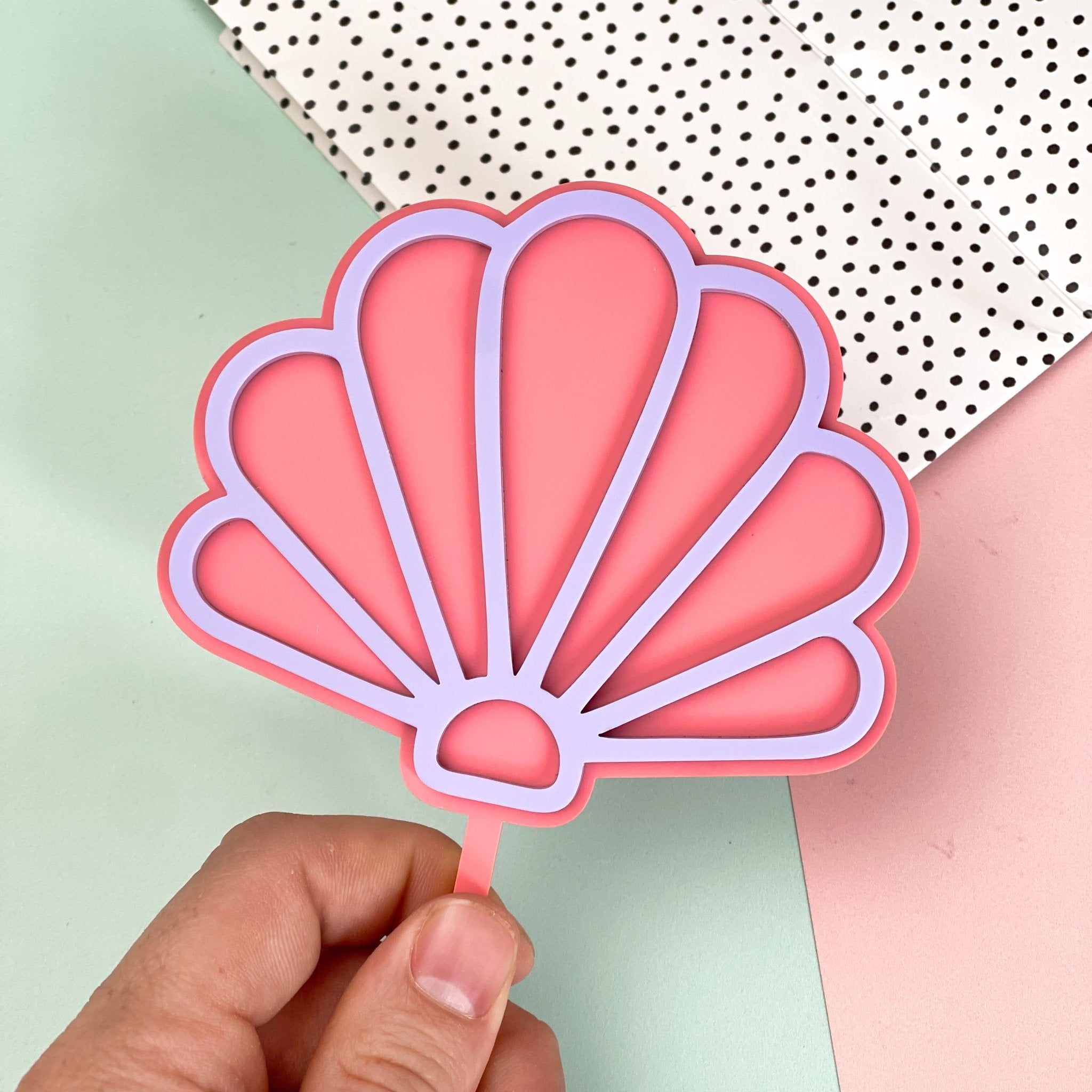 Double layer shell topper