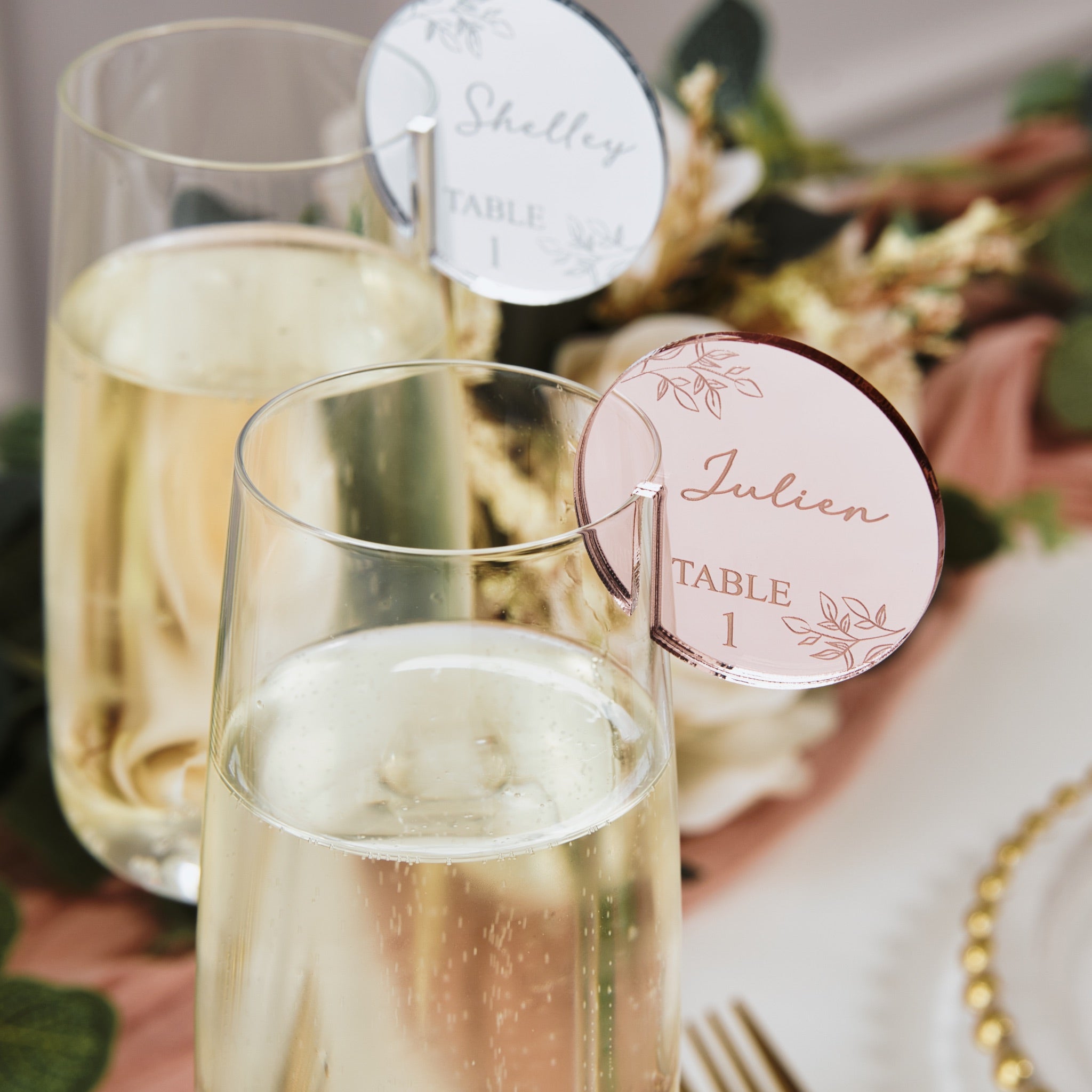 Place name cards with table numbers