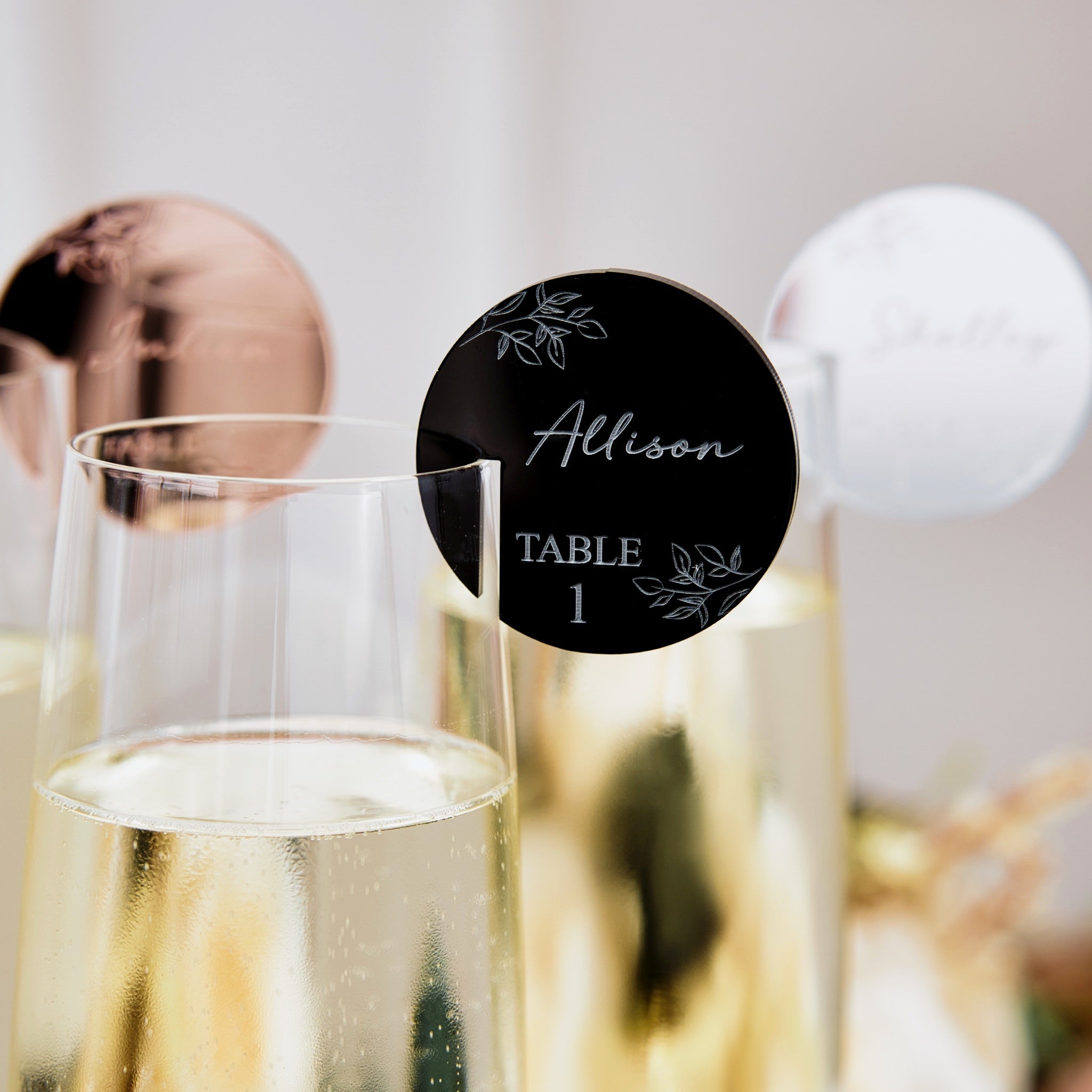Table name tags for wine glasses.