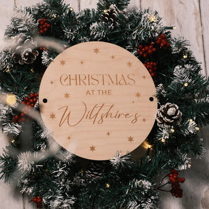 wooden christmas at the family wreath sign