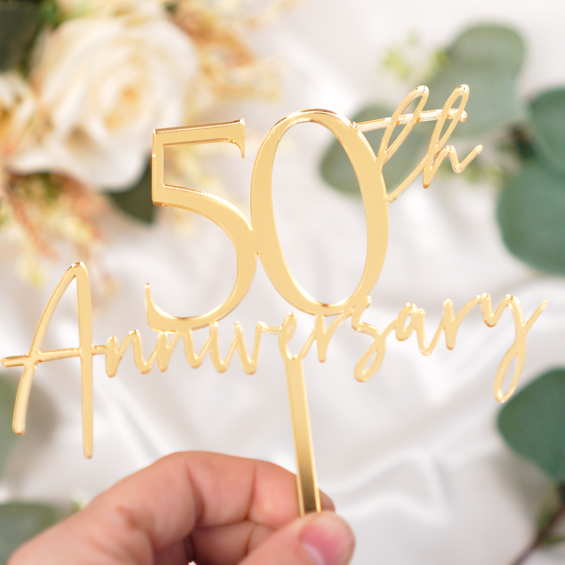 Anniversary cake topper