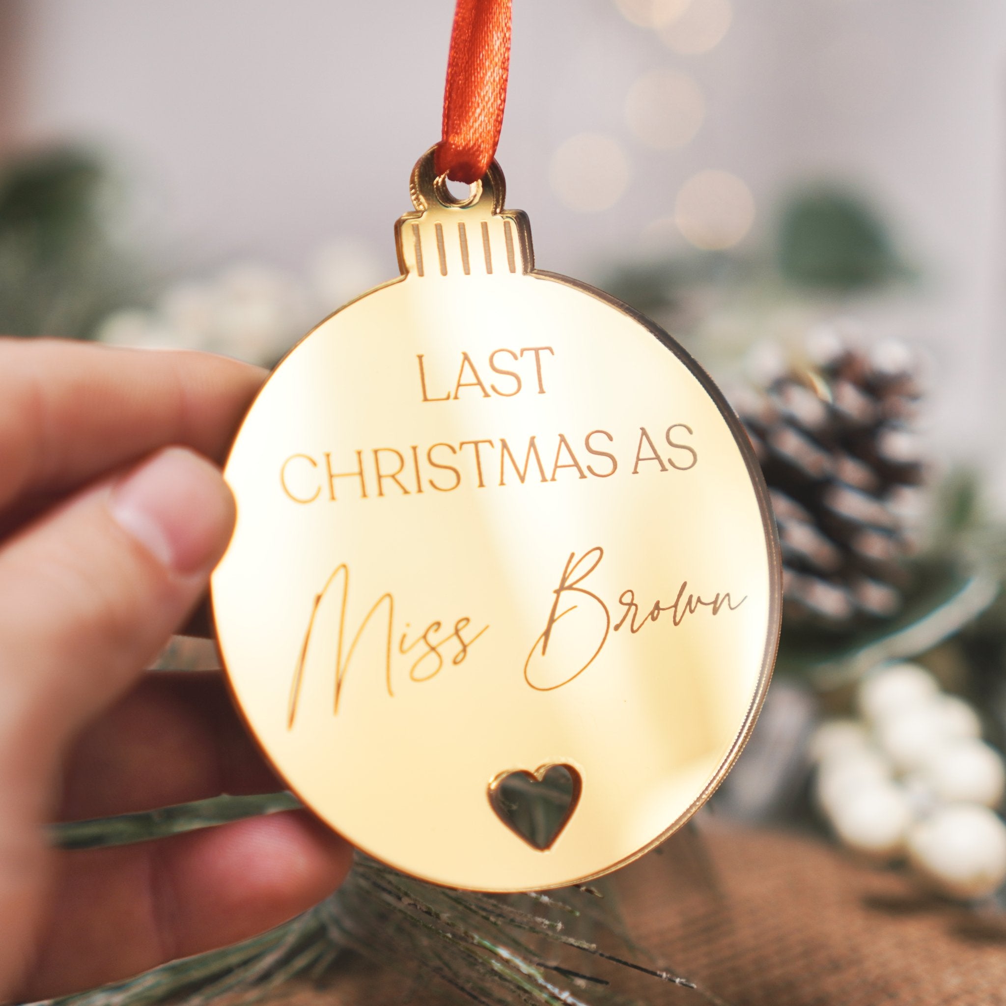 personalised Christmas ornament decoration with heart cut out for friend