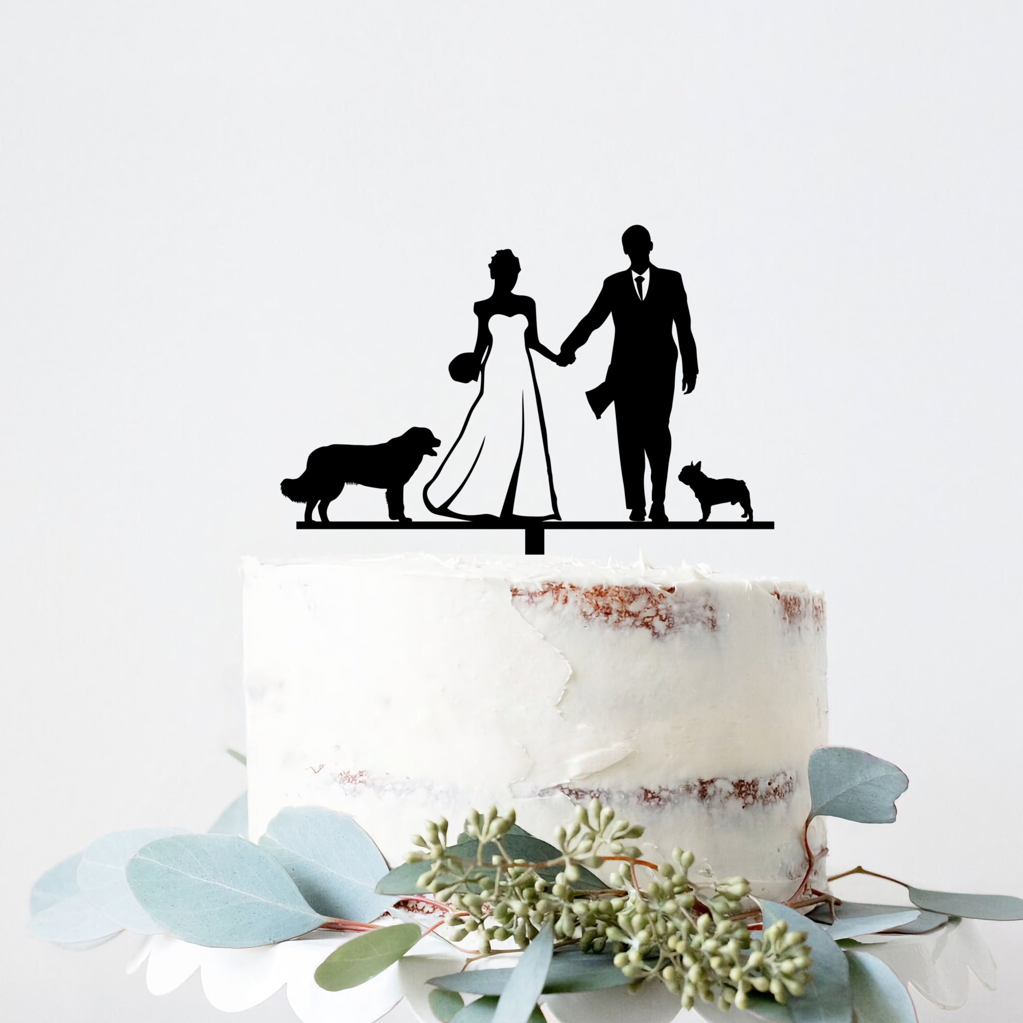 Wedding cake topper couple and 2 dogs